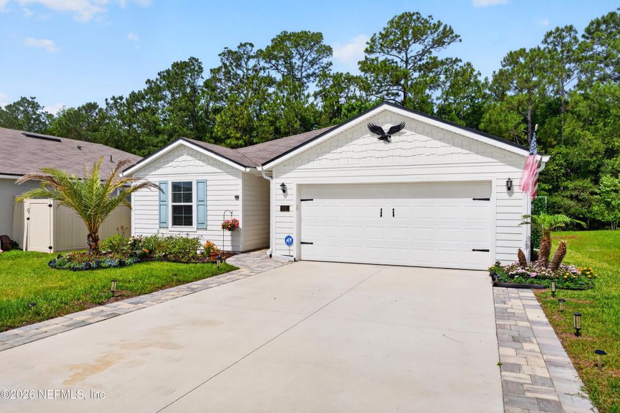 Front exterior of a new home in , St. Augustine, FL, highlighting curb appeal (Image 18).