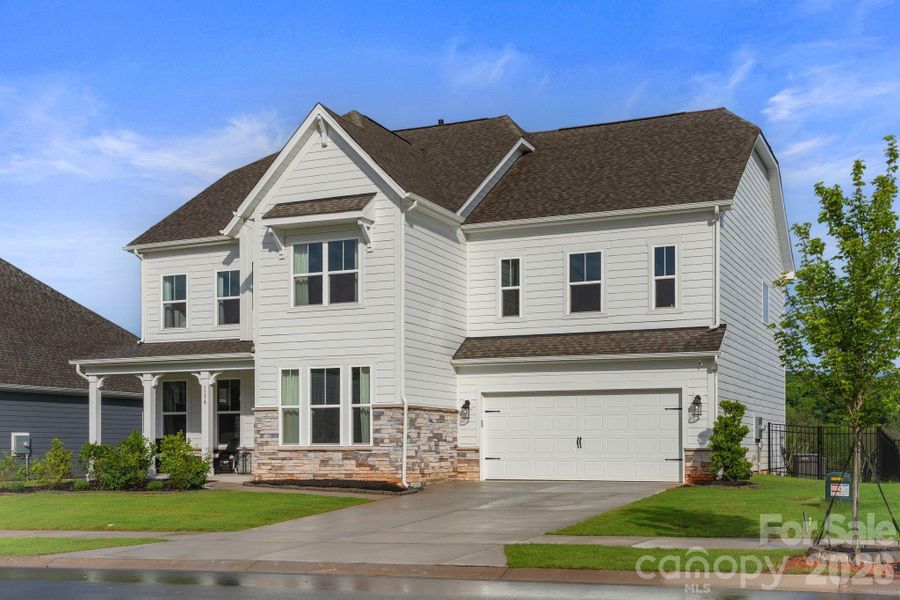 Front exterior of a new home in , Indian Land, SC, highlighting curb appeal (Image 22).