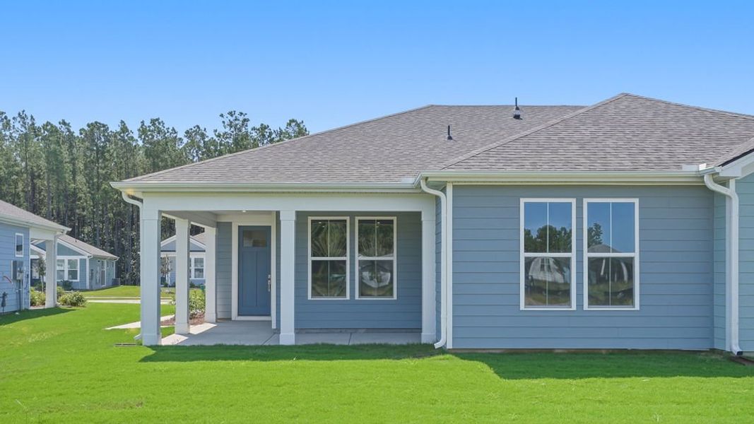 Exterior details and patio area of a home in Sun City Hilton Head, Bluffton (Image 3).