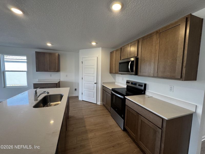 Furnished interior view inside a new home in Copes Landing, Jacksonville (Image 33).