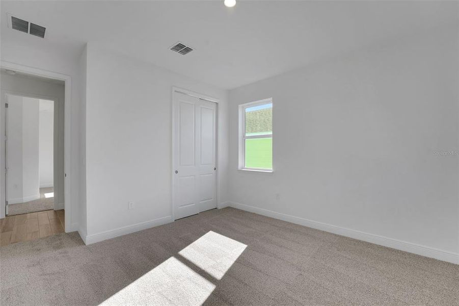Spacious, unfurnished interior of a new home in Green Key Village, Lady Lake (Image 21).
