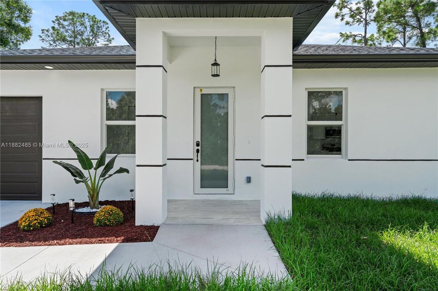Exterior details and patio area of a home in , Lehigh Acres (Image 2).