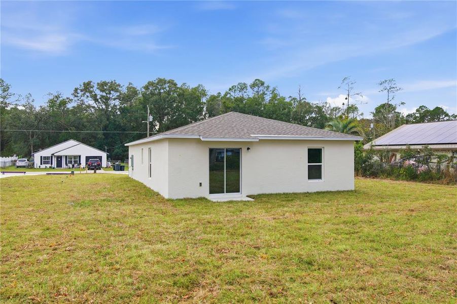 Exterior details and patio area of a home in Rainbow Lakes Estates, Dunnellon (Image 4). Exterior details and patio area of a home in Rainbow Lakes Estates, Dunnellon (Image 4).