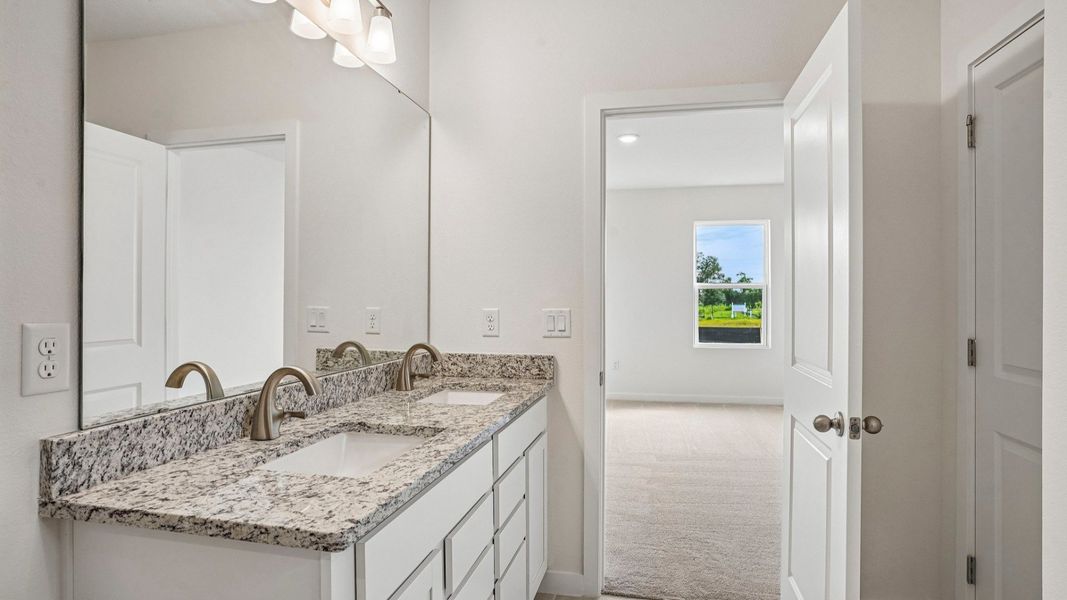 Furnished interior view inside a new home in Willowbrook North, Winter Haven (Image 24).