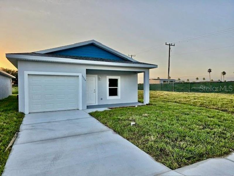 Front exterior of a new home in , Sebring, FL, highlighting curb appeal (Image 1). Front exterior of a new home in , Sebring, FL, highlighting curb appeal (Image 1).