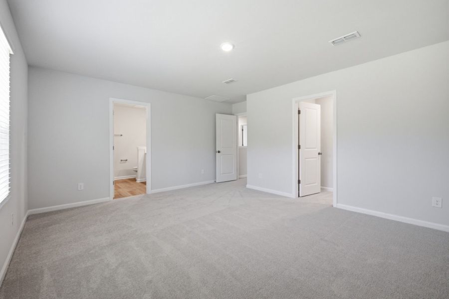 Spacious, unfurnished interior of a new home in Carpenter Falls, Durham (Image 26).