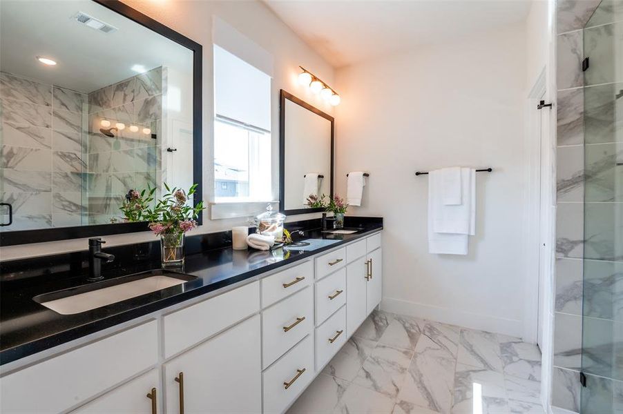 Ahhhh spa-like primary  bathroom with beautiful over-sized walk-in shower