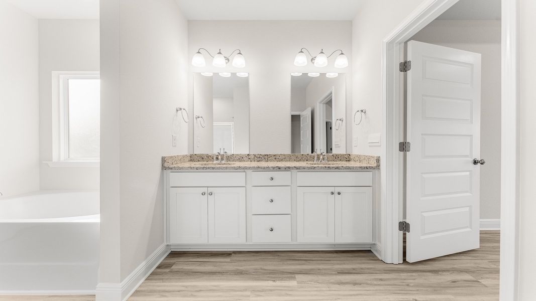 Representative furnished interior of a home built from the The Destin by D.R. Horton in Pine Creek and Heron Walk, Port St. Joe (Image 39).