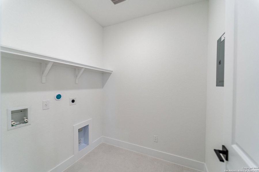 Spacious, unfurnished interior of a new home in The Woodlands at Medina Hills, Mico (Image 18).