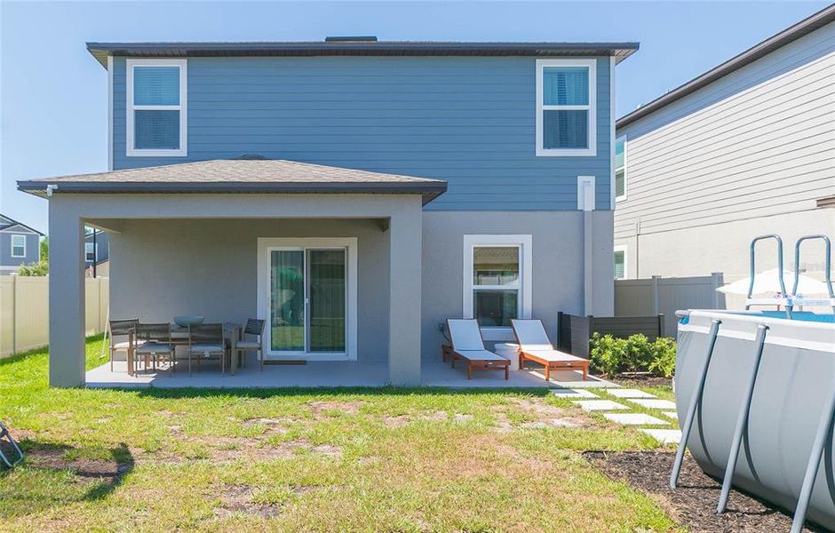 Exterior details and patio area of a home in Angeline, Land O' Lakes (Image 3).