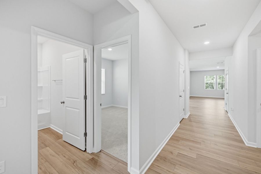 Spacious, unfurnished interior of a new home in Carpenter Falls, Durham (Image 24).
