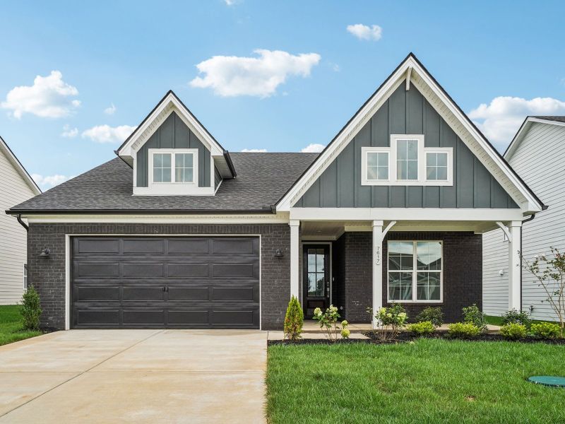 Front exterior of a new home in Sycamore Grove, Murfreesboro, TN, highlighting curb appeal (Image 1). Front exterior of a new home in Sycamore Grove, Murfreesboro, TN, highlighting curb appeal (Image 1).