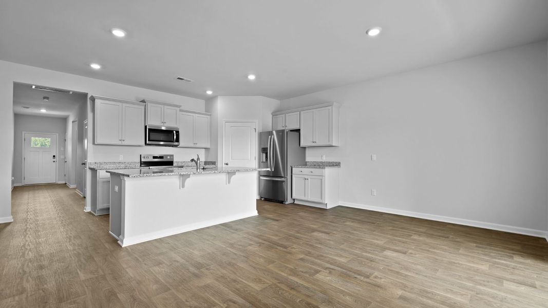 Furnished interior view inside a new home in Pine Hills at Cane Bay, Summerville (Image 10).