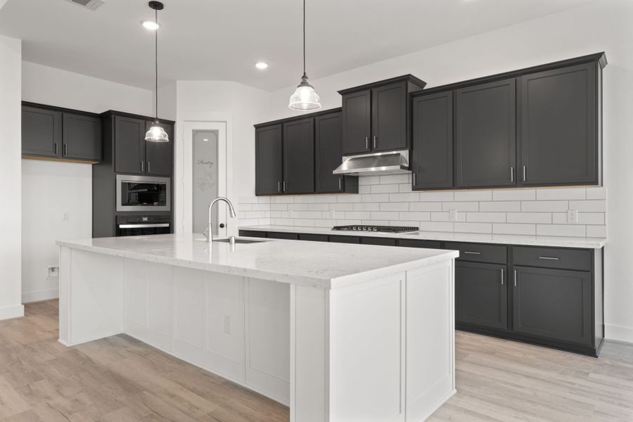 Representative furnished interior of a home built from the Alamo by HistoryMaker Homes in Hunters Crossing 60s, Sealy (Image 7). Representative furnished interior of a home built from the Alamo by HistoryMaker Homes in Hunters Crossing 60s, Sealy (Image 7).