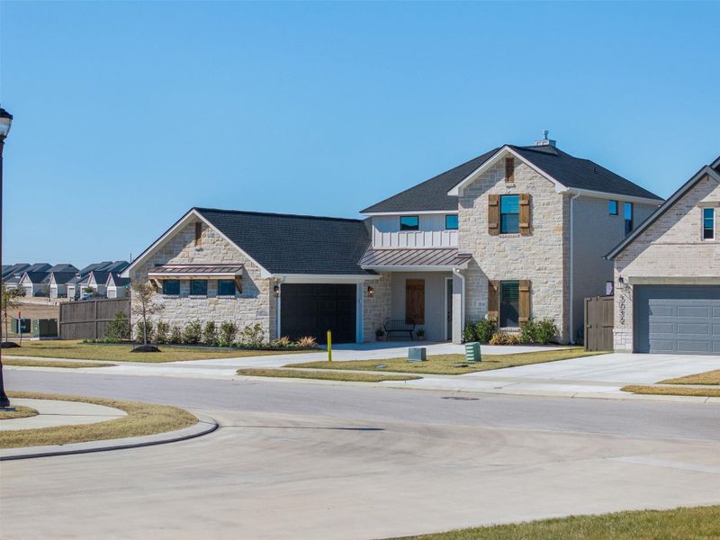 Front exterior of a new home in , Bryan, TX, highlighting curb appeal (Image 29).