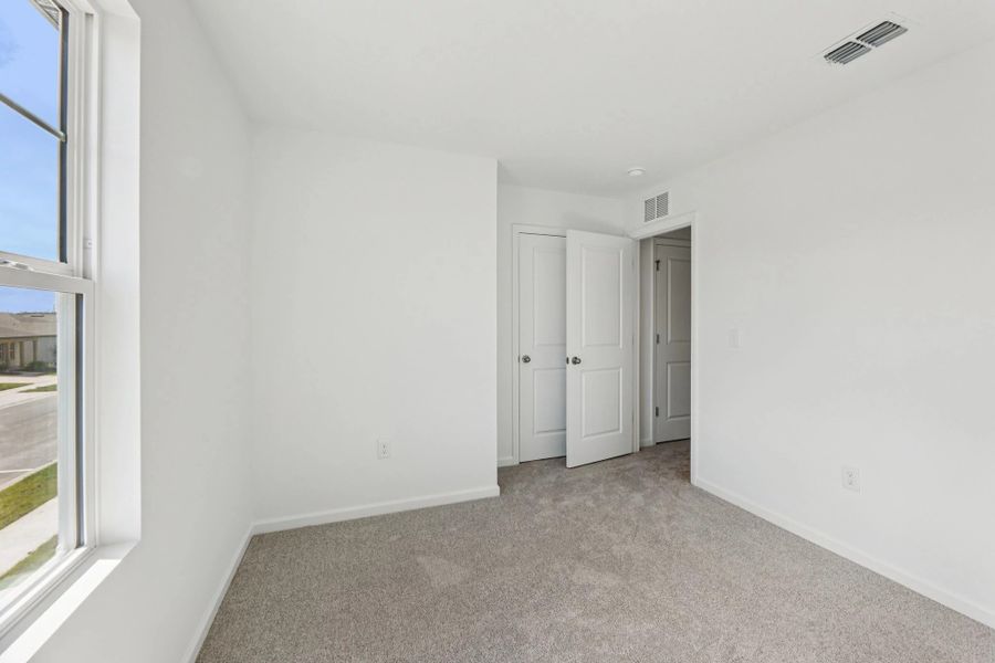 Representative unfurnished interior of a home built from the Lyon by Starlight Homes in Hawks Run, Kissimmee (Image 27). Representative unfurnished interior of a home built from the Lyon by Starlight Homes in Hawks Run, Kissimmee (Image 27).