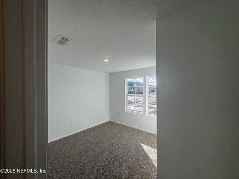 Spacious, unfurnished interior of a new home in The Arbors, Jacksonville (Image 38).