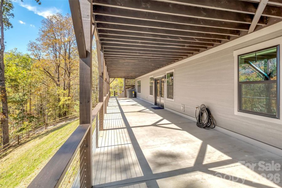 Exterior details and patio area of a home in , Waynesville (Image 24).