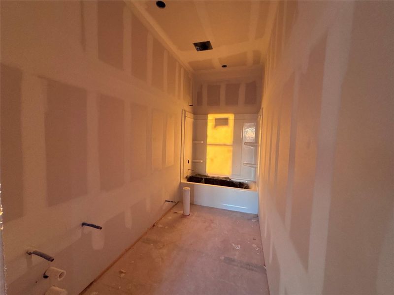 In-progress construction of a new home in The Colony 45s, Bastrop, TX (Image 23).