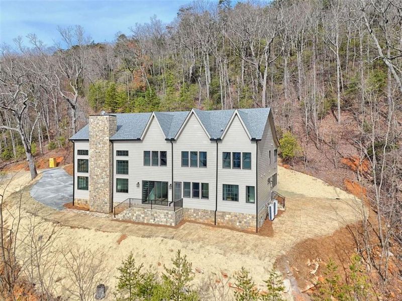Front exterior of a new home in , Clayton, GA, highlighting curb appeal (Image 27).