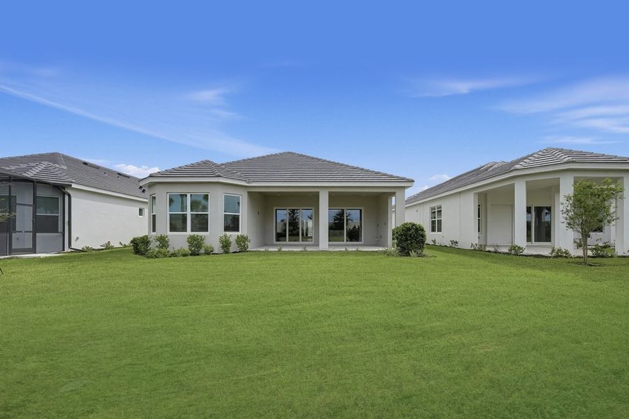 Exterior details and patio area of a home in Esplanade at Azario Lakewood Ranch, Bradenton (Image 4).