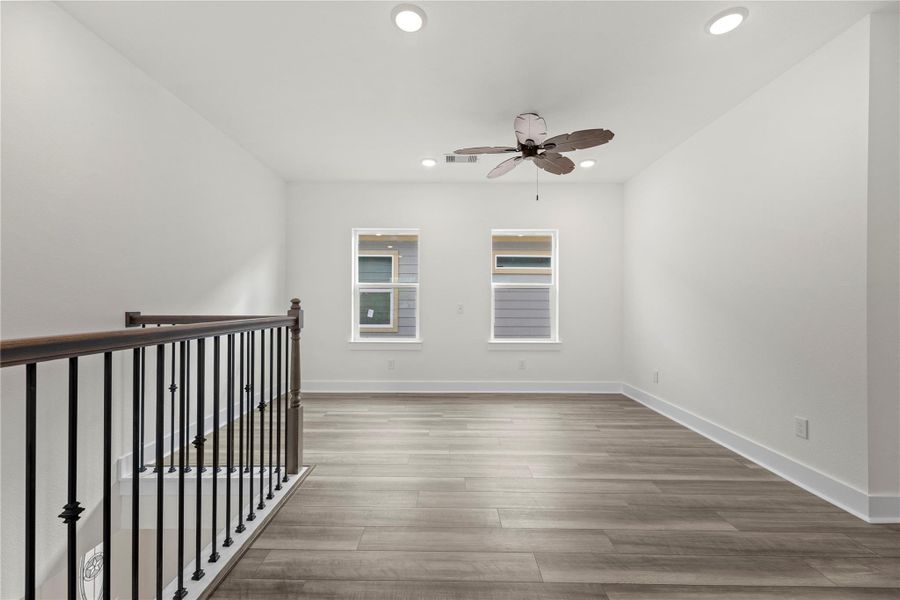 Whether utilized as an additional family space or a teen hangout area, the 2nd floor bonus room offers a multitude of possibilities. Easily arrange a couch and television for daily enjoyment and add a pool table or chess board for some friendly competition! Whether utilized as an additional family space or a teen hangout area, the 2nd floor bonus room offers a multitude of possibilities. Easily arrange a couch and television for daily enjoyment and add a pool table or chess board for some friendly competition!