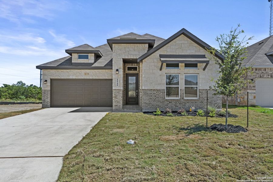 Front exterior of a new home in , New Braunfels, TX, highlighting curb appeal (Image 2). Front exterior of a new home in , New Braunfels, TX, highlighting curb appeal (Image 2).
