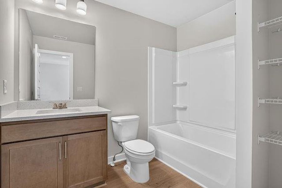 Furnished interior view inside a new home in The Cottages at East Lanier, Fayetteville (Image 4).