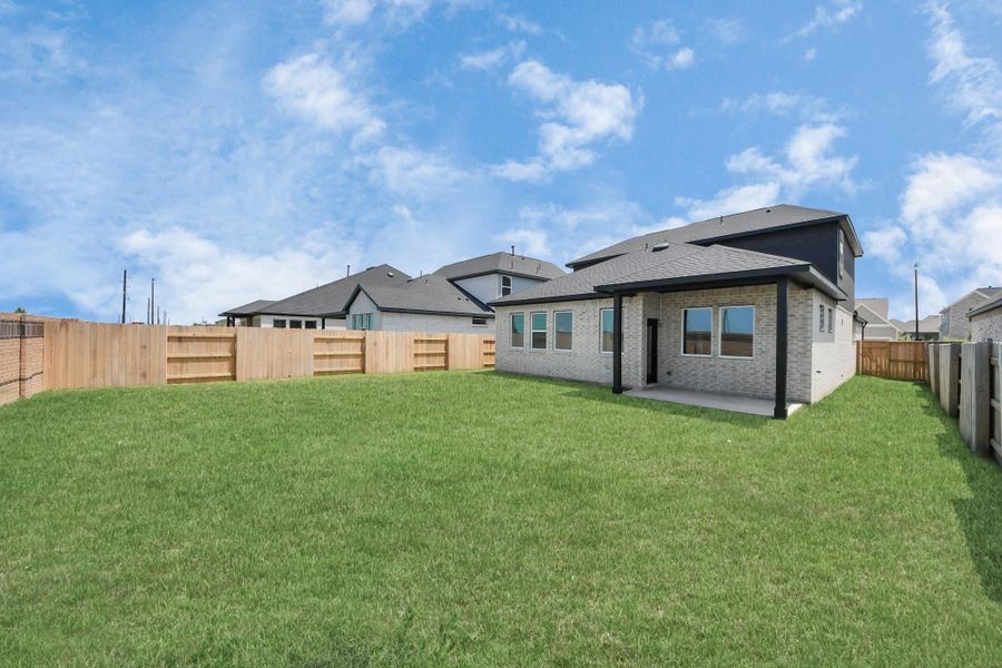 Exterior details and patio area of a home in 50' Traditional Homes at Elyson, Katy (Image 4).