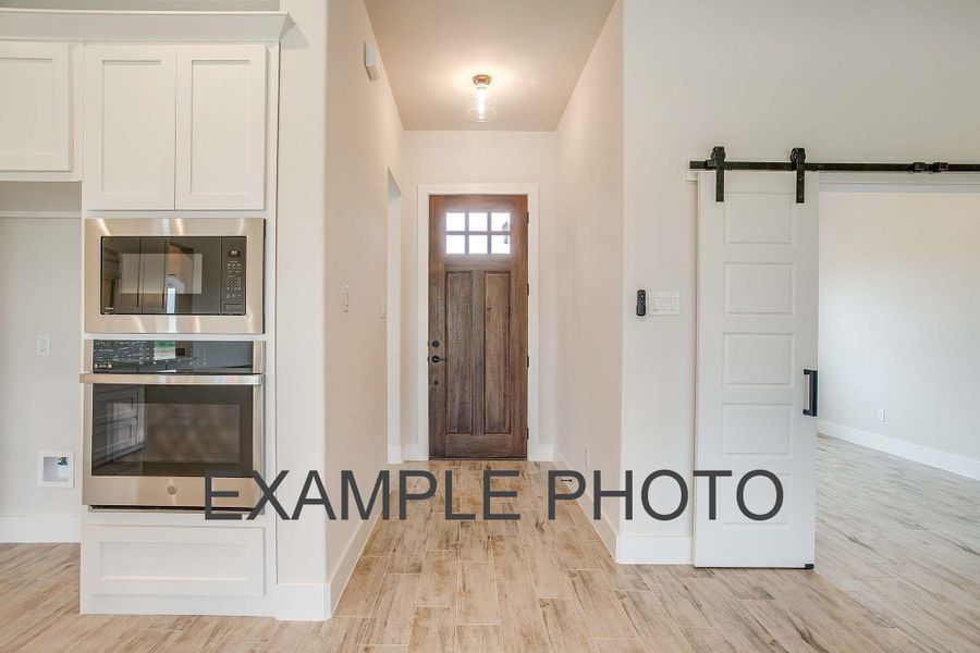Representative furnished interior of a home built from the The Iris by Kenmark Homes in Rocky Top Ranch, Reno (Image 14).