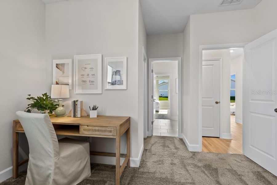 Furnished interior view inside a new home in The Cypress Series at Reserve East, Flagler Beach (Image 15).
