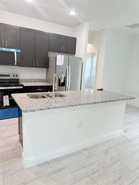 Furnished interior view inside a new home in , Citrus Springs (Image 3). Furnished interior view inside a new home in , Citrus Springs (Image 3).