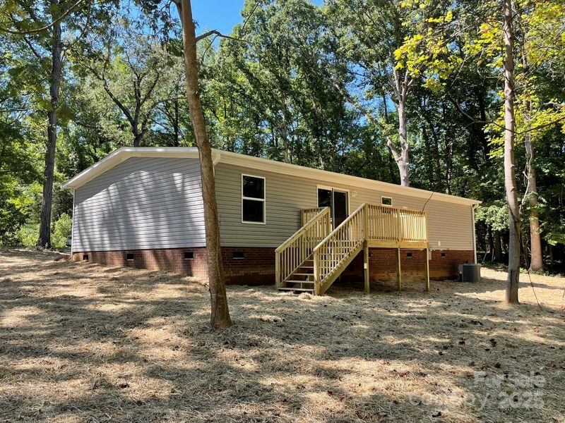 Front exterior of a new home in , Rock Hill, SC, highlighting curb appeal (Image 15).