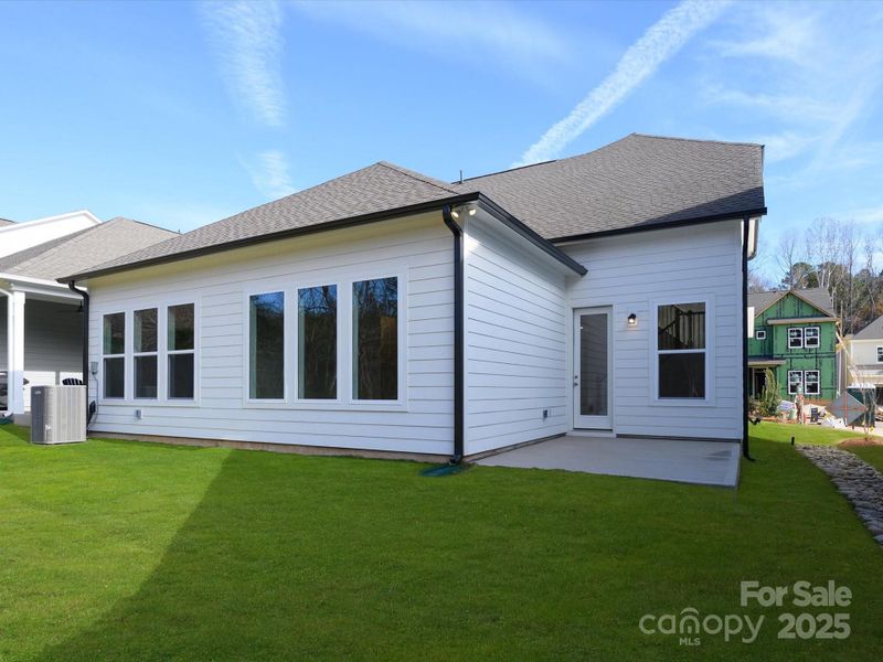 Exterior details and patio area of a home in North Creek Village, Huntersville (Image 24).