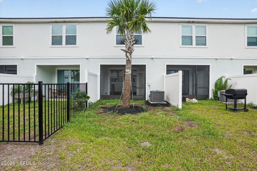 Exterior details and patio area of a home in Ravenswood Village, St. Augustine (Image 3).