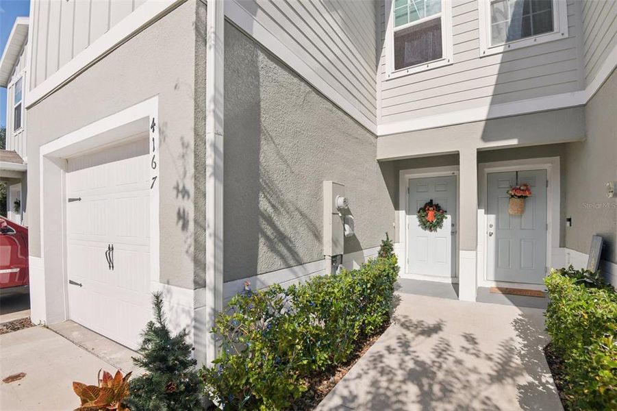Exterior details and patio area of a home in Anclote Square, Holiday (Image 3).