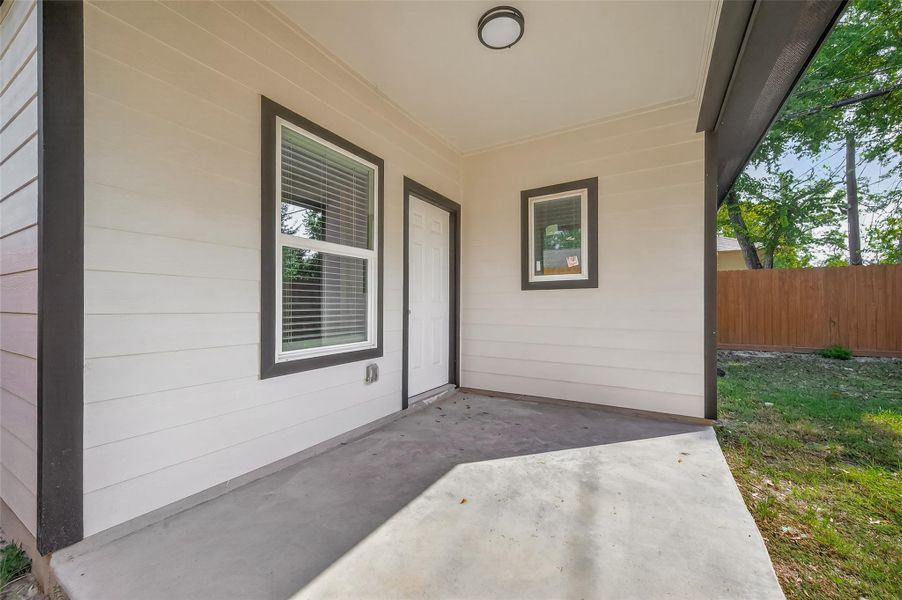 Exterior details and patio area of a home in , Houston (Image 3).