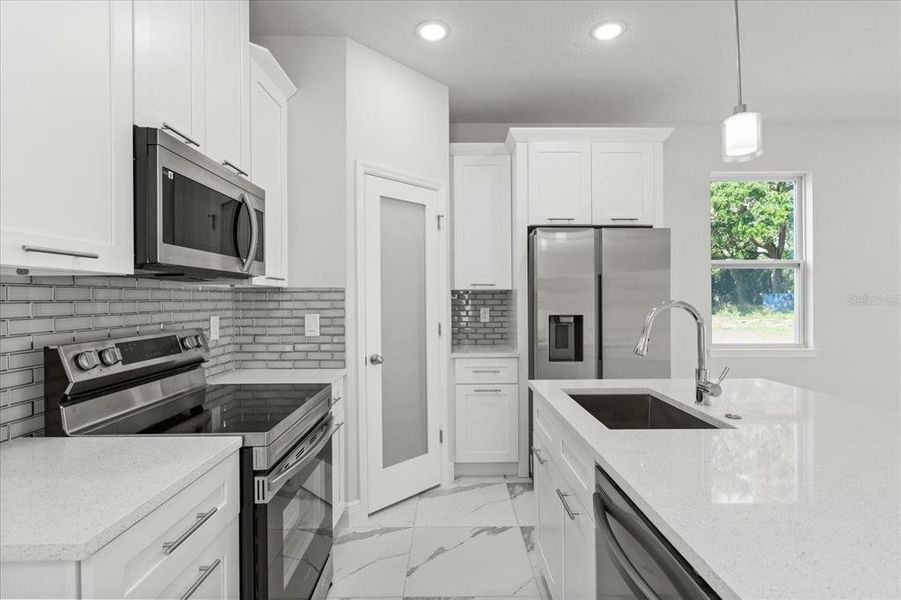 Furnished interior view inside a new home in , Kissimmee (Image 7).