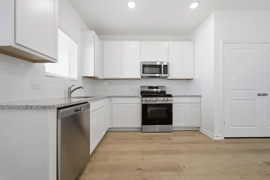 Furnished interior view inside a new home in Westridge, McKinney (Image 5).