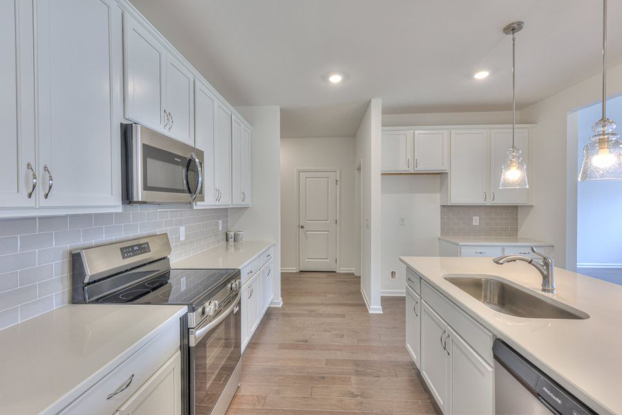 *Photo of example home. Selections & Finishes May Vary.