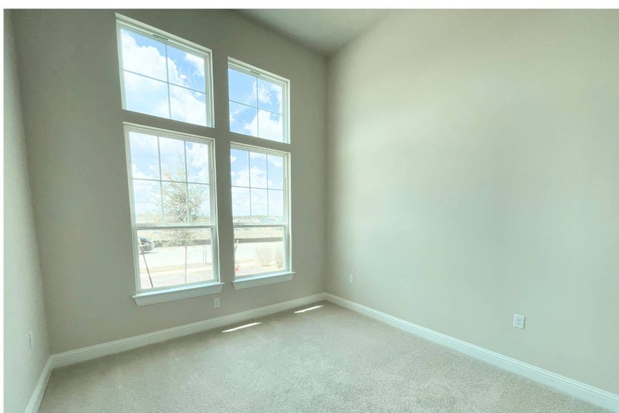 Spacious, unfurnished interior of a new home in Whisper Valley, Manor (Image 30).