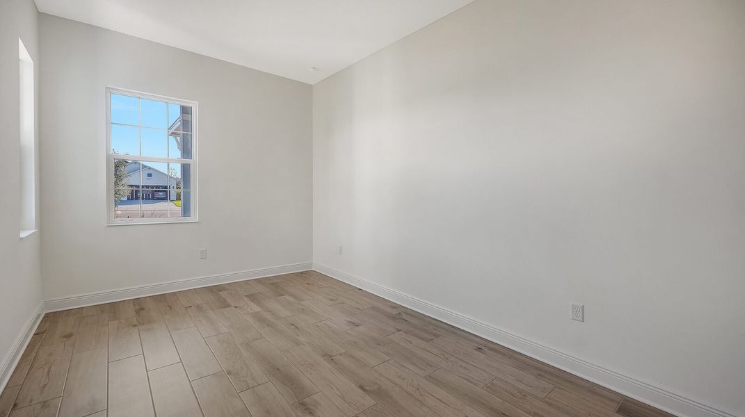 Spacious, unfurnished interior of a new home in Wildleaf, Parrish (Image 39).