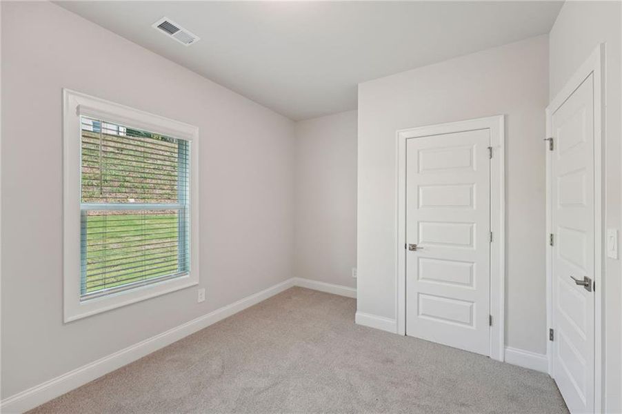 Spacious, unfurnished interior of a new home in Hemingway - Reserve Series, Cumming (Image 39).