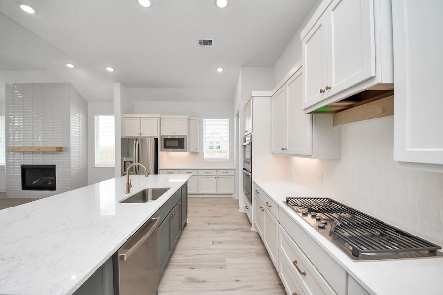 Furnished interior view inside a new home in Meridiana Courtyard Collection, Manvel (Image 12).