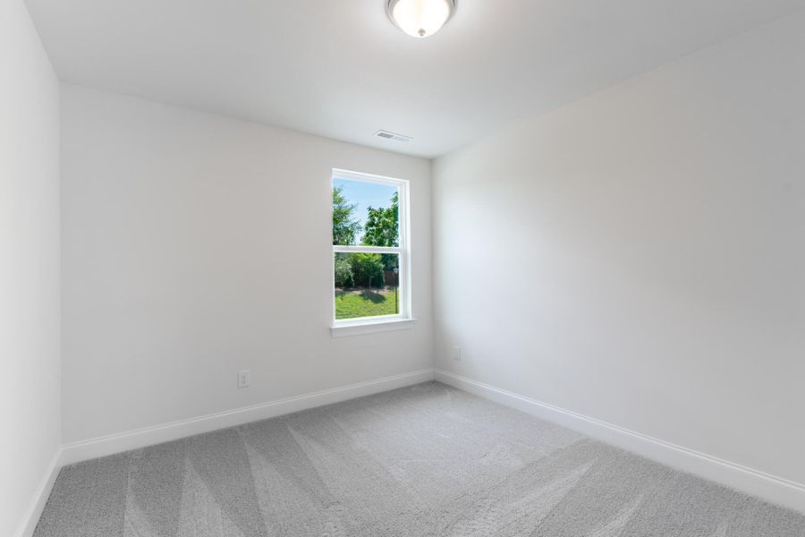 Spacious, unfurnished interior of a new home in Enclave at Traditions Townhomes, Wake Forest (Image 21).