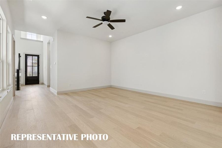 The entire family will love gathering in this spacious family room!  REPRESENTATIVE PHOTO