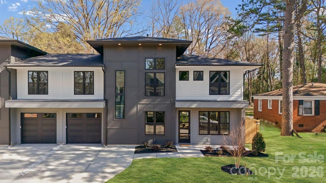 Front exterior of a new home in , Charlotte, NC, highlighting curb appeal (Image 24).