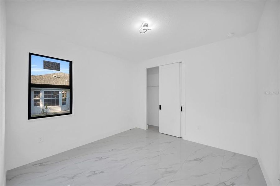 Spacious, unfurnished interior of a new home in , Punta Gorda (Image 14).