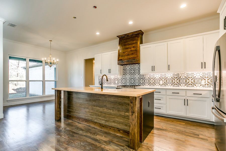 Representative furnished interior of a home built from the Cypress Court House by Trinity Classic Homes in Freeman Ranch, Weatherford (Image 9).