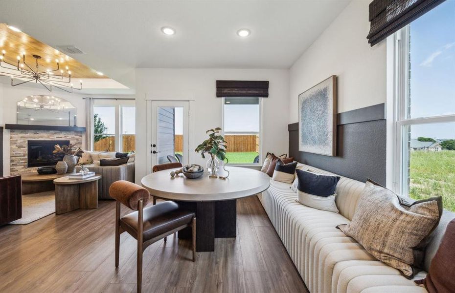 *Model Representation - Dining nook off kitchen with large windows